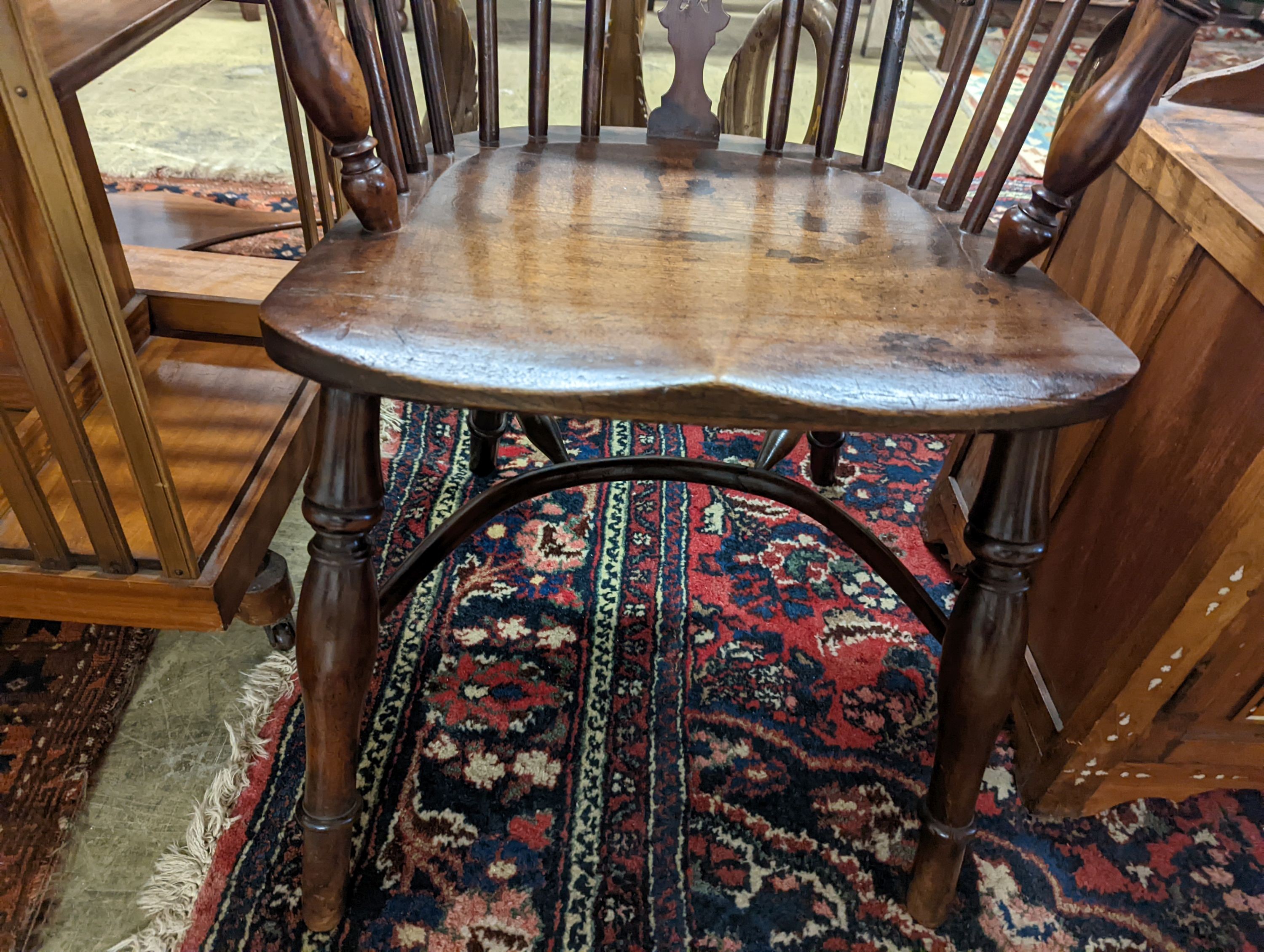 A mid 19th century Derbyshire area yew and elm Windsor elbow chair, width 57cm, depth 40cm, height 92cm